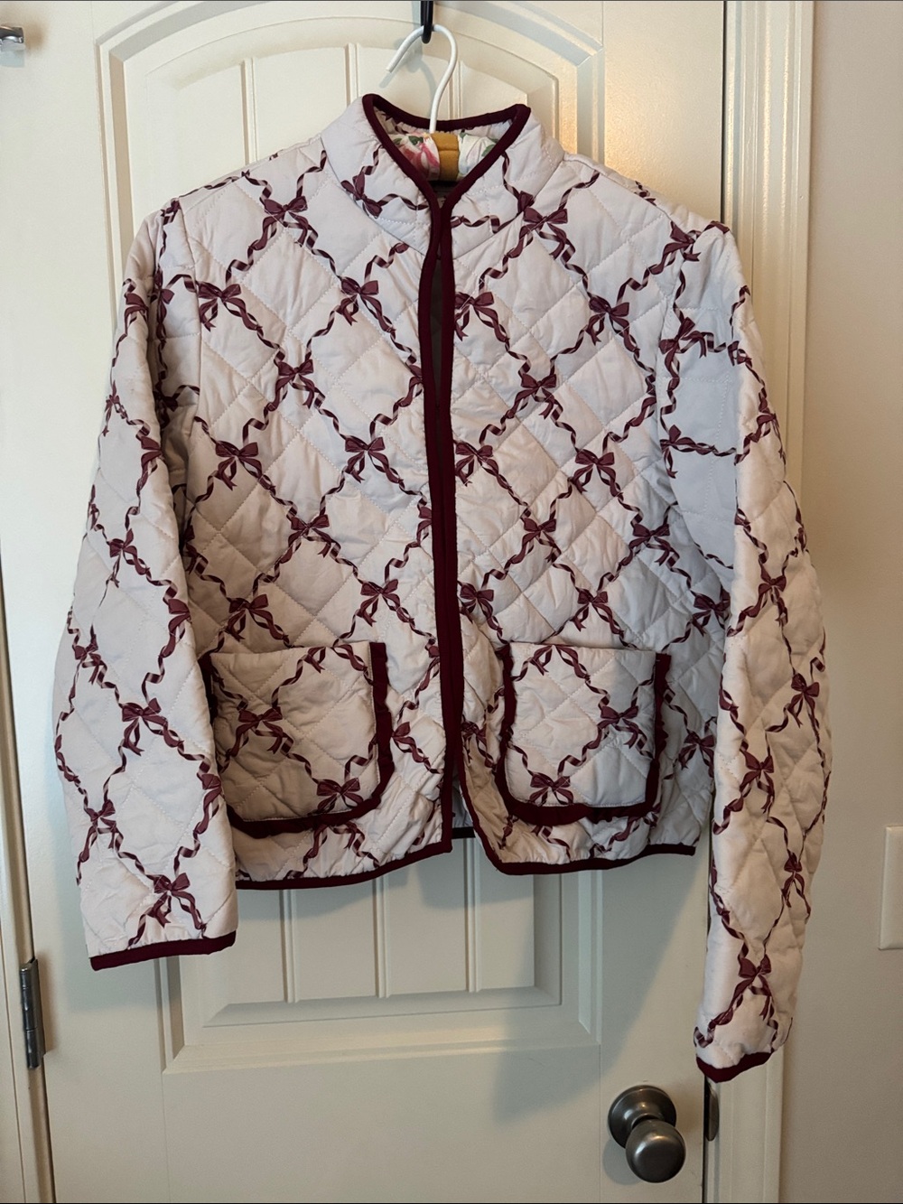 Quilted Cream Jacket with Burgundy Ribbon Pattern